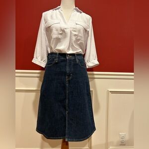 Denim skirt. Size 27. 23 inches long.